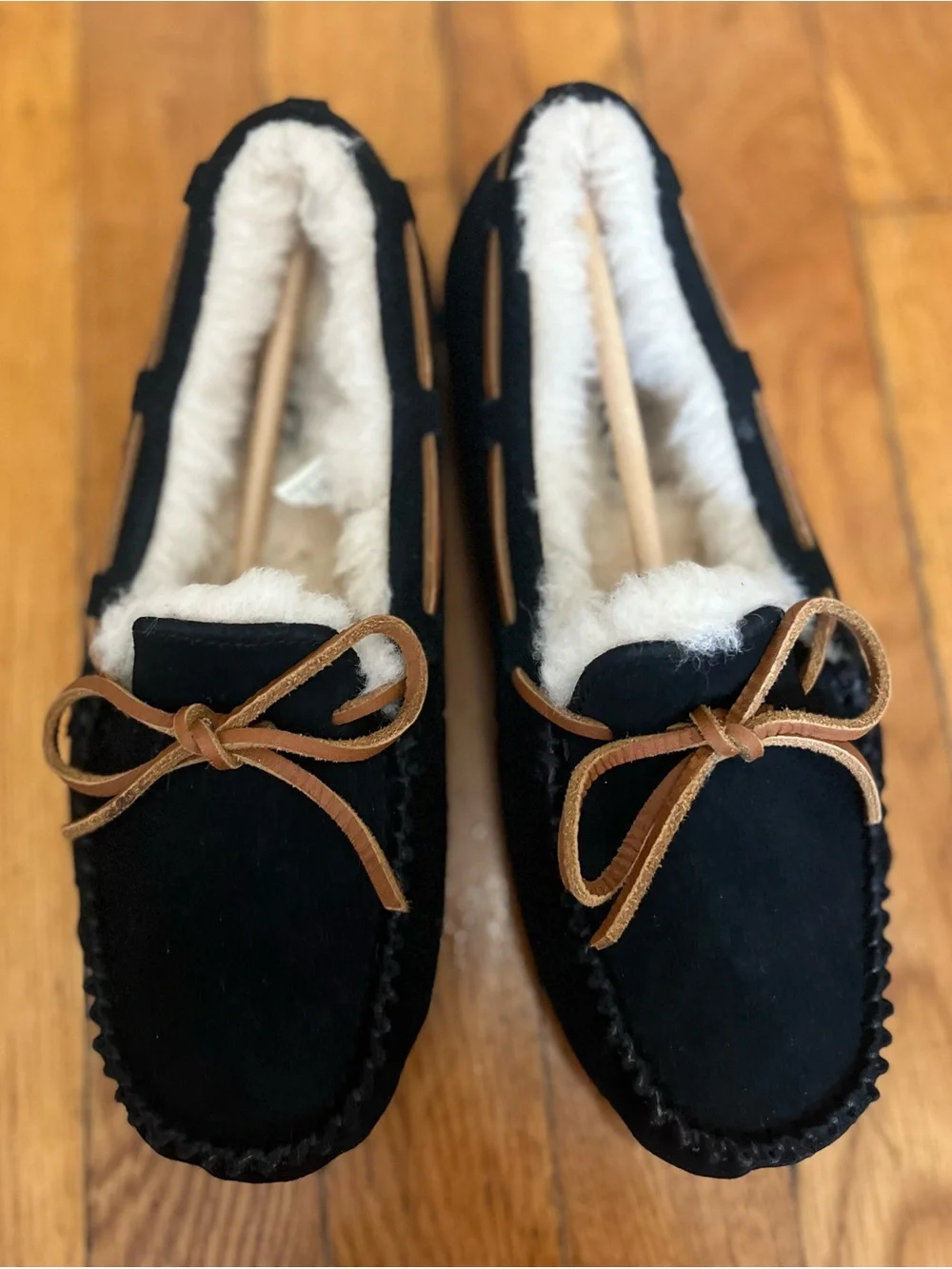 UGG Black Suede Moccasin Slippers with Tan Leather Laces and Cream Shearling